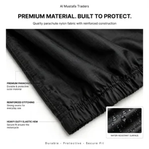 Close-up of premium black parachute nylon ripstop fabric showing reinforced stitching and elastic hem with water beading detail
